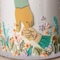 HAND IN GARDEN CAKE