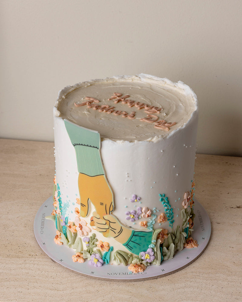 HAND IN GARDEN CAKE